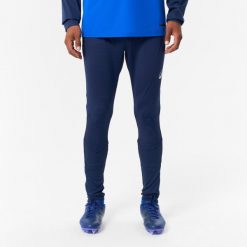 Spodnie piłkarskie Kipsta CLR Club topowa gama. Niebieskie spodnie sportowe męskie KIPSTA, xl, bez wzorów, z materiału, do piłki nożnej. Za 139.99 zł.