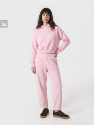 Spodnie dresowe z bawełną - różowy. Czerwone spodnie dresowe damskie Sinsay, l, bez wzorów, z bawełny. Za 39.99 zł.