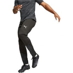 Spodnie męskie Puma Teamcup Pant. Czarne spodnie sportowe męskie Puma, m, bez wzorów, z materiału, na fitness i siłownię. Za 290.00 zł.