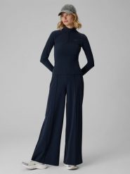 4F Spodnie dresowe z szerokimi nogawkami damskie - granatowe XL. Niebieskie spodnie dresowe damskie 4f, l, bez wzorów, z dresówki, trekkingowe. Za 169.99 zł.