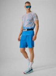 4F Spodenki do biegania szybkoschnące męskie - niebieskie M. Niebieskie krótkie spodenki sportowe męskie 4f, m, bez wzorów, z materiału, do biegania. Za 169.99 zł.