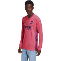 Koszulka treningowa męska Adidas Real Madrid z długim rękawem. Czerwone koszulki sportowe męskie Adidas, m, bez wzorów, z poliesteru, bez kołnierzyka, bez ramiączek. W wyprzedaży za 311.00 zł.