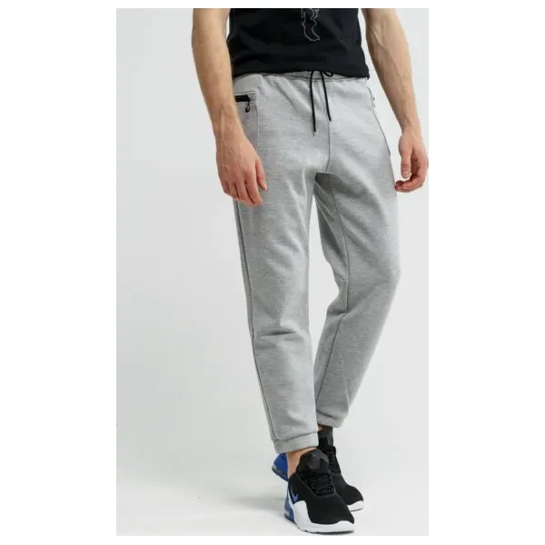 Feewear Spodnie Ambato , szary, rozmiar L. Szare spodnie sportowe męskie Feewear, l, bez wzorów, z bawełny. W wyprzedaży za 59.99 zł.