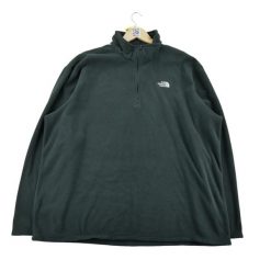 Bluza polarowa męska The North Face. Czarne bluzy sportowe męskie The North Face, l, bez wzorów, z polaru, bez kaptura. Za 106.46 zł.