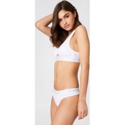 Calvin Klein Stringi Cotton - White. Stringi damskie marki Calvin Klein. Za 80.95 zł.