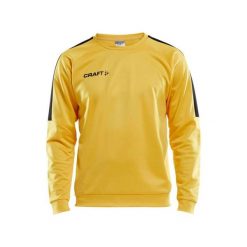 Bluza z okrągłym dekoltem Craft progress r-neck. Żółte bluzy męskie Craft, l, bez wzorów, bez kaptura. Za 179.95 zł.