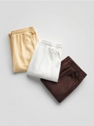 Spodnie dresowe jogger z bawełną - złamana biel. Spodnie dresowe damskie Reserved, l, bez wzorów, z bawełny. W wyprzedaży za 39.99 zł.