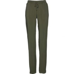 Spodnie z gumką w talii bonprix ciemnooliwkowy. Spodnie materiałowe damskie marki DOMYOS. Za 54.99 zł.