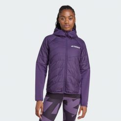 Ocieplana hybrydowa kurtka z kapturem Terrex Multi CLIMAWARM. Fioletowe kurtki damskie Adidas, l, bez wzorów, z kapturem, trekkingowe, climawarm (adidas). Za 529.00 zł.