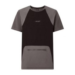 Oakley Koszulka Verve Rc Kangaroo Pocket Foa405450-02E. Czarne koszulki sportowe męskie Oakley, uniwersalny, bez wzorów, z bawełny, bez kołnierzyka, bez ramiączek. Za 143.45 zł.