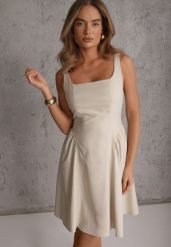 Beżowa Sukienka na Ramiączkach o Rozkloszowanym Kroju Podkreślającym Talię Cecial. Brązowe sukienki dla dziewczynek Renee, bez wzorów, eleganckie, bez ramiączek, krótkie. Za 119.99 zł.
