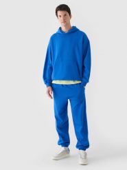 4F Spodnie dresowe oversize męskie - niebieskie XXL. Niebieskie spodnie sportowe męskie 4f, m, bez wzorów, z bawełny. W wyprzedaży za 79.99 zł.
