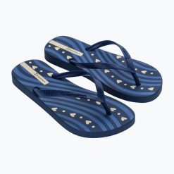 Japonki damskie Ipanema Classica Happy XVIII. Niebieskie klapki damskie Ipanema, bez wzorów, z materiału, klasyczne, bez obcasa. Za 62.99 zł.