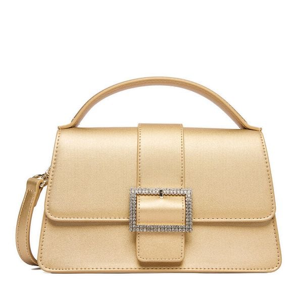 Torebka Nine West. Żółte torebki do ręki damskie Nine West, bez wzorów, klasyczne, bez dodatków. Za 199.99 zł.