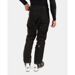 Spodnie narciarskie Kilpi Methone. Czarne spodnie sportowe męskie Kilpi, na zimę, m, bez wzorów, narciarskie. Za 835.17 zł.