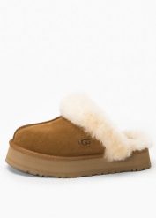 Kapcie damskie brązowe UGG W DISQUETTE. Brązowe kapcie damskie UGG, bez wzorów. Za 523.99 zł.