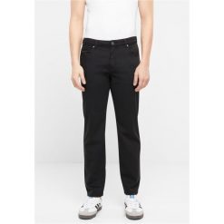 Spodnie chino z 5 kieszeniami Urban Classics Stretch. Czarne spodnie materiałowe męskie Urban Classics, m, bez wzorów. Za 206.00 zł.