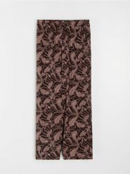 Wiskozowe spodnie wide leg z motywem roślinnym - wielobarwny. Spodnie materiałowe damskie Sinsay, l, bez wzorów, z wiskozy. Za 39.99 zł.