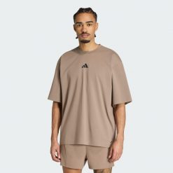 Koszulka PrimeLift Workout Oversize. Zielone koszulki sportowe męskie Adidas, l, bez wzorów, z bawełny, bez kołnierzyka, bez ramiączek, na fitness i siłownię. Za 199.00 zł.