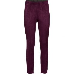 Legginsy z materiału w optyce skóry welurowej bonprix czarny bez. Legginsy damskie marki DOMYOS. Za 79.99 zł.