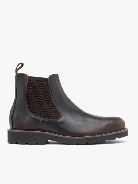 Ciemnobrązowe skórzane sztyblety. Brązowe botki męskie Brawo sp. z o.o., ze skóry, eleganckie, przed kolano, bez zapięcia. Za 629.99 zł.