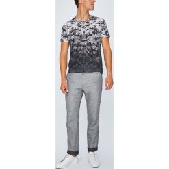 Medicine - Spodnie Monumental. Eleganckie spodnie męskie marki Giacomo Conti. W wyprzedaży za 79.90 zł.