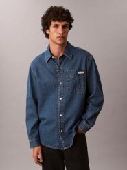 Calvin Klein Jeans koszula dżinsowa Mężczyźni Modern Fit Bawełna niebieski, L. Niebieskie koszule męskie Calvin Klein Jeans, l, bez wzorów, z bawełny, bez kołnierzyka, bez ramiączek. Za 329.95 zł.