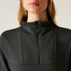 Damska elastyczna warstwa środkowa z zamkiem błyskawicznym. Czarne bluzy sportowe damskie Dare 2b, bez wzorów, bez kaptura, narciarskie. Za 186.40 zł.