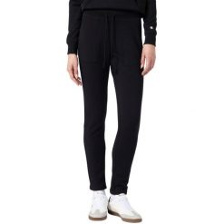 Spodnie damskie Champion Slim Pants. Czarne spodnie dresowe damskie Champion, xs, bez wzorów, z dresówki. Za 151.99 zł.