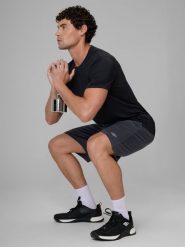 4F Spodenki treningowe szybkoschnące męskie - granatowe M. Niebieskie krótkie spodenki sportowe męskie 4f, m, bez wzorów, z materiału, na fitness i siłownię. Za 99.99 zł.