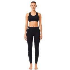 Spodnie sportowe damskie Lacoste. Czarne spodnie sportowe damskie Lacoste, uniwersalny, bez wzorów, z elastanu, na fitness i siłownię. Za 357.00 zł.