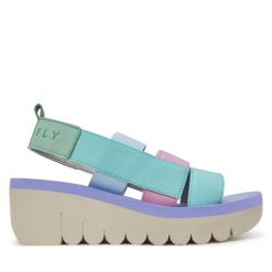 Sandały Fly London. Niebieskie sandały damskie Fly London, bez wzorów, bez obcasa, na koturnie, bez zapięcia. Za 379.99 zł.