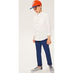Spodnie chino - Niebieski. Spodnie materiałowe damskie marki Reserved. Za 99.99 zł.