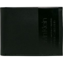 Calvin Klein - Portfel skórzany. Niebieskie portfele męskie Calvin Klein, bez wzorów, z materiału. W wyprzedaży za 219.90 zł.