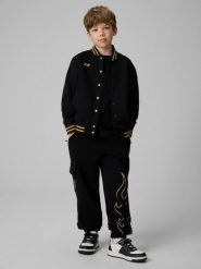 4F Spodnie dresowe joggery dziecięce 4F x Bartosz Zmarzlik - czarne 122/128 (6-8 lat). Czarne spodnie sportowe dla dziewczynek 4f, bez wzorów, z bawełny. Za 159.99 zł.