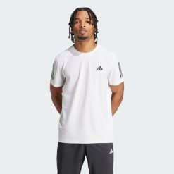 Koszulka Own The Run. Białe koszulki sportowe męskie Adidas, xs, bez wzorów, z materiału, bez kołnierzyka, bez ramiączek, do biegania. Za 149.00 zł.