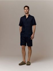 Lniana koszula slim fit - granatowy. Niebieskie koszule męskie Reserved, l, bez wzorów, z tkaniny, bez kołnierzyka, bez ramiączek. Za 159.99 zł.