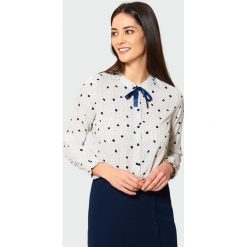 Elegancka koszula z wiązaniem. Bluzki damskie marki Greenpoint. Za 49.99 zł.