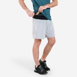 Spodenki do biegania w terenie męskie Kiprun Run 900 Ultra. Szare krótkie spodenki sportowe męskie KIPRUN, l, bez wzorów, ze skóry, do biegania. W wyprzedaży za 69.99 zł.