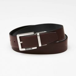 Pasek męski Big Star, naturalna skóra licowa w ciemnobrązowym kolorze z metalową klamrą o matowym wykończeniu oraz klasyczną szerokością do codzienne. Brązowe paski damskie Big Star Accessories, bez wzorów, ze skóry, eleganckie. Za 118.99 zł.