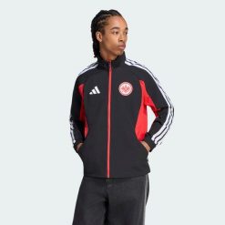 Podstawowa bluza reprezentacyjna Eintracht Frankfurt. Czarne bluzy sportowe męskie Adidas, m, bez wzorów, z dresówki, bez kaptura, do piłki nożnej. Za 529.00 zł.