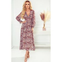 Sukienka midi z dekoltem. Niebieskie sukienki damskie NUMOCO, m, bez wzorów, z elastanu, bez kołnierzyka, bez ramiączek, midi. Za 369.90 zł.
