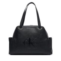 Torebka Calvin Klein. Czarne torebki do ręki damskie Calvin Klein, bez wzorów, klasyczne, bez dodatków. Za 649.99 zł.
