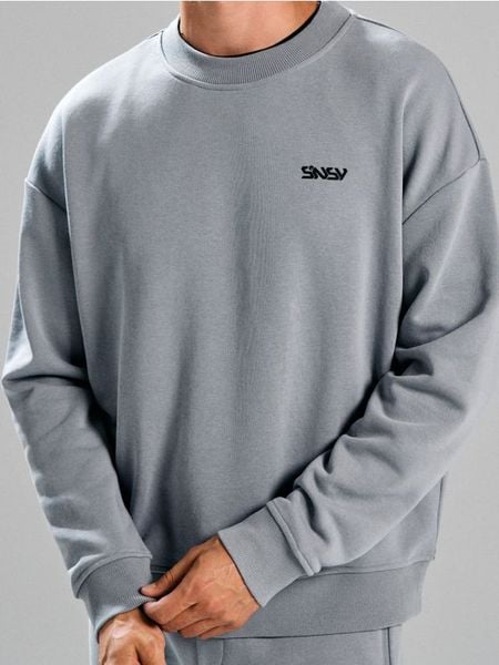 Bluza crewneck SNSY PERFORMANCE - szary. Szare bluzy męskie Sinsay, l, bez wzorów, bez kaptura. Za 27.99 zł.