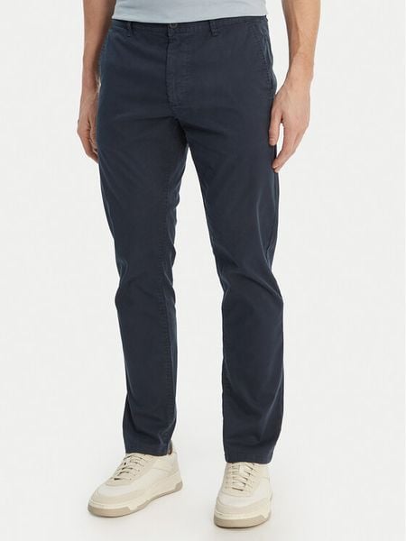 BOSS Chinosy Chino 50554754 Granatowy Slim Fit. Niebieskie eleganckie spodnie męskie Boss, m, bez wzorów, z bawełny. Za 360.99 zł.