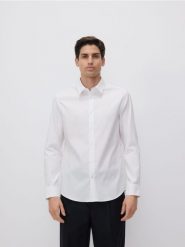 Bawełniana koszula slim fit - biały. Białe koszule męskie Reserved, l, bez wzorów, z bawełny, bez kołnierzyka, bez ramiączek. W wyprzedaży za 119.99 zł.