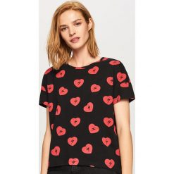 T-shirt we wzory - Czarny. T-shirty damskie marki Reserved. Za 29.99 zł.