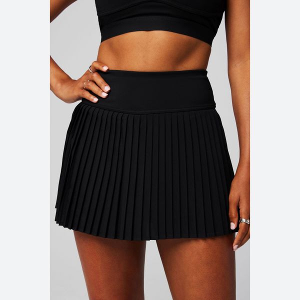 Damska plisowana spódnica Fabletics Classic. Czarne spódnice damskie FABLETICS, xl, bez wzorów, z materiału. Za 284.50 zł.