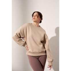 Bluza do jogi Moonholi Just Perfect oversize z bawełnianej dzianiny. Brązowe bluzy sportowe damskie MOONHOLI, s, bez wzorów, z bawełny, bez kaptura, na fitness i siłownię. Za 429.00 zł.