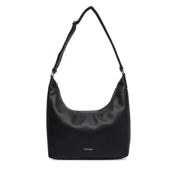 Torebka Calvin Klein. Czarne torebki do ręki damskie Calvin Klein, bez wzorów, klasyczne, bez dodatków. Za 474.99 zł.
